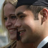 Rodrigo Gonzalez poses with a fellow graduate after Commencement